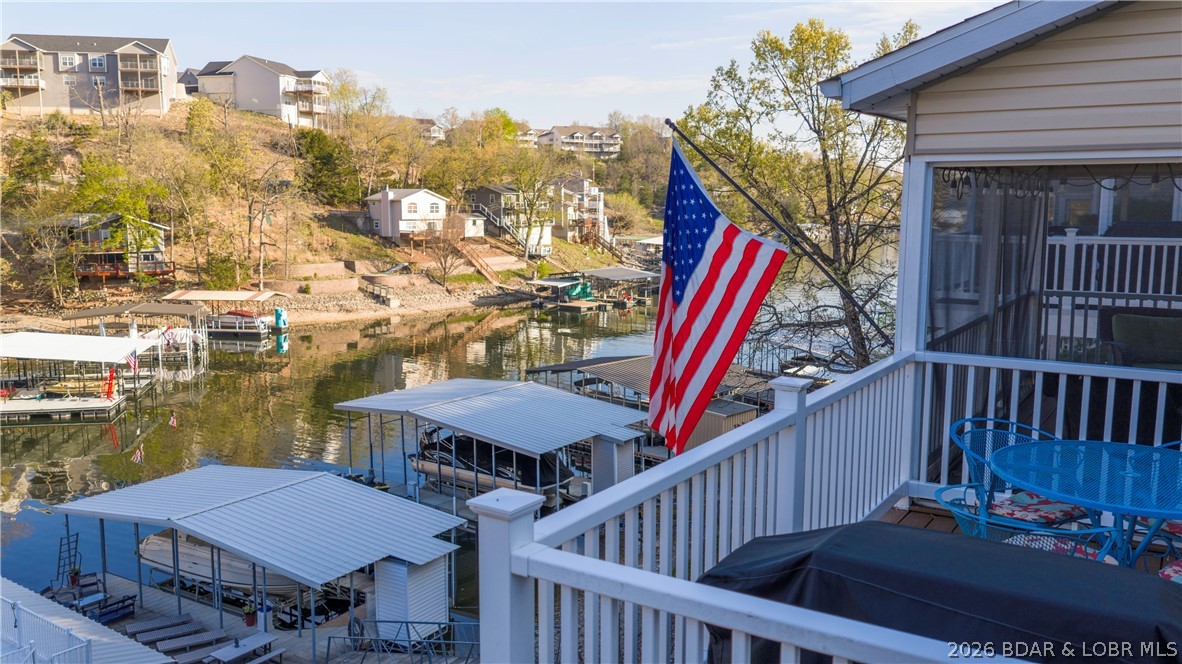 1453 Ginger Road Lake Ozark, MO 65049 - Photo 15 of 46 Upper deck offer open space for grilling and cover
