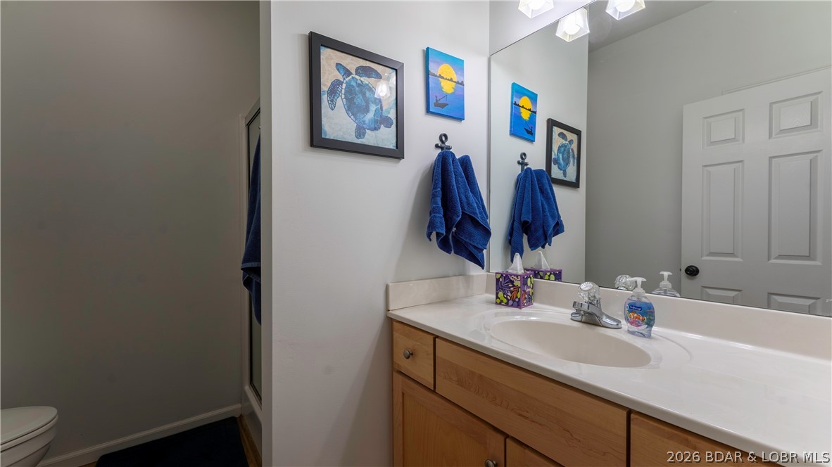 1453 Ginger Road Lake Ozark, MO 65049 - Photo 18 of 46 Main level ensuite bath