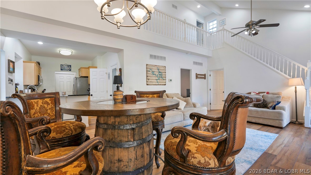 1453 Ginger Road Lake Ozark, MO 65049 - Photo 5 of 46 Grand living area with beautiful LPV flooring