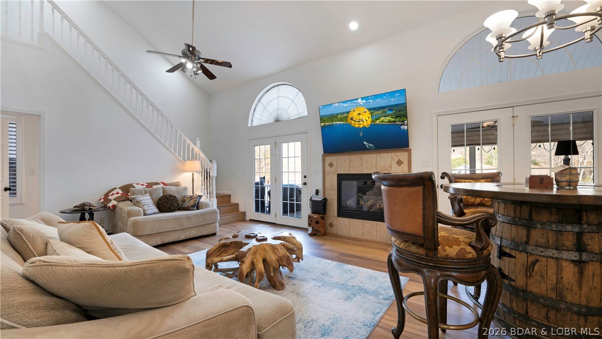 1453 Ginger Road Lake Ozark, MO 65049 - Photo 8 of 46 Fireplace with multiple accesses to deck