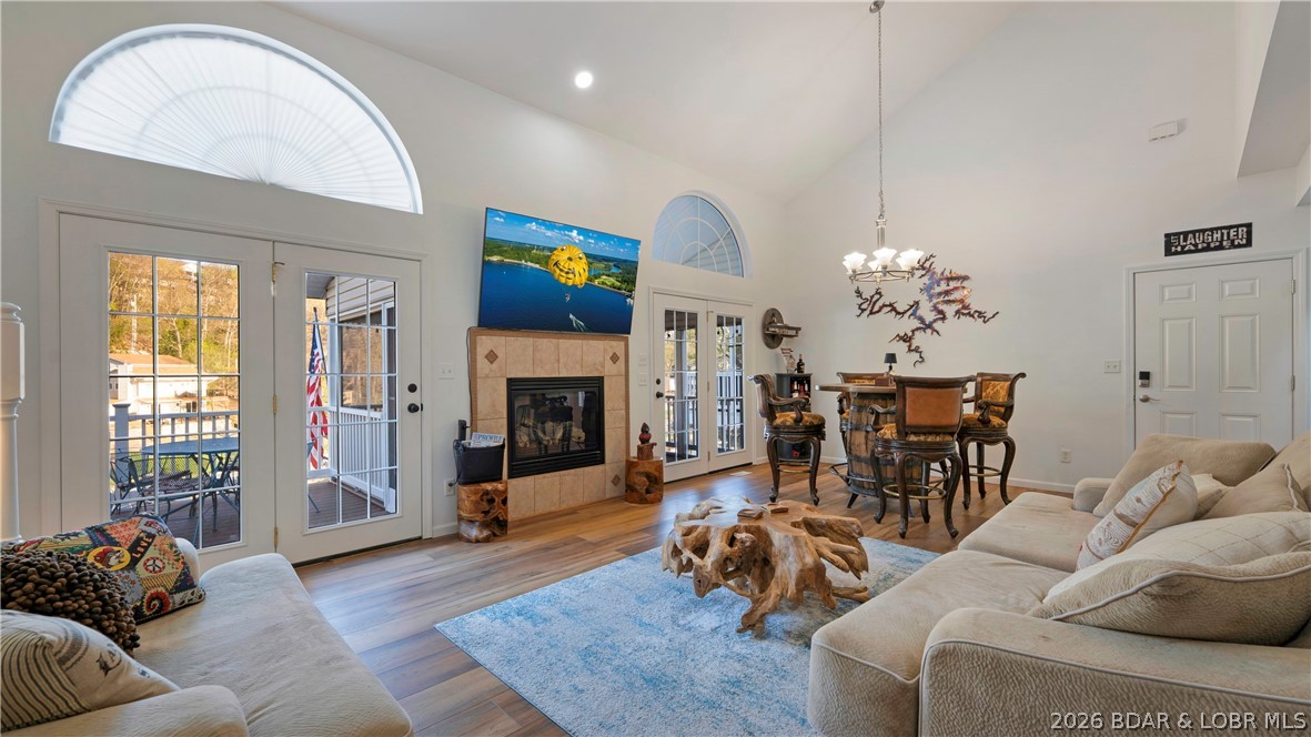 1453 Ginger Road Lake Ozark, MO 65049 - Photo 9 of 46 Main level living with easy access to upper and lo