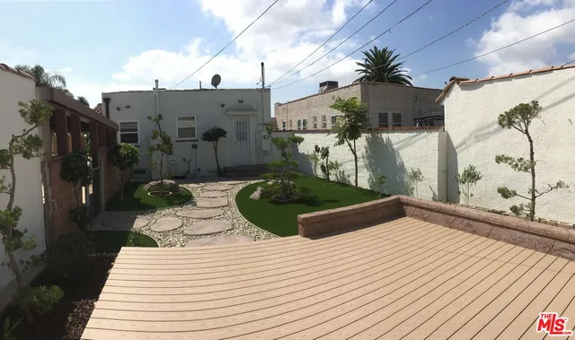 a bathroom with a bathtub and shower