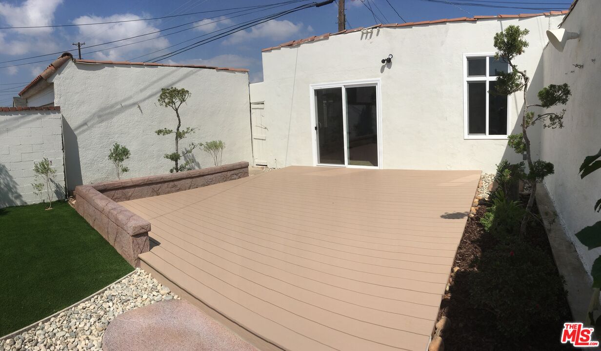 2107 West 84th Place Los Angeles, CA 90047 - Photo 24 of 25 a view of balcony and front door