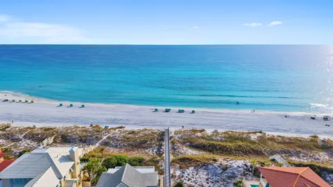 a kitchen with stainless steel appliances granite countertop a stove and cabinets