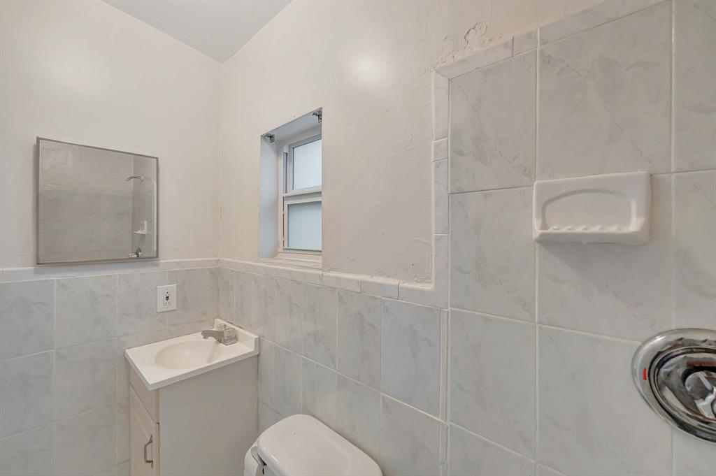 Palmetto Estates Miami, FL 33157 - Photo 17 of 48 a bathroom with a toilet sink and mirror