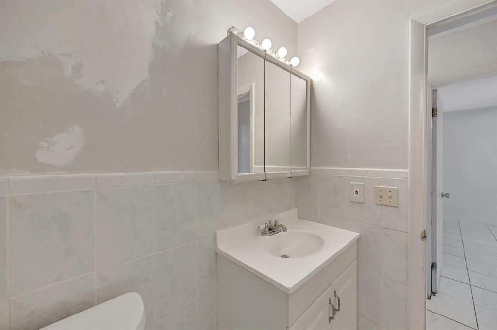 Palmetto Estates Miami, FL 33157 - Photo 30 of 48 a bathroom with a sink a toilet and mirror