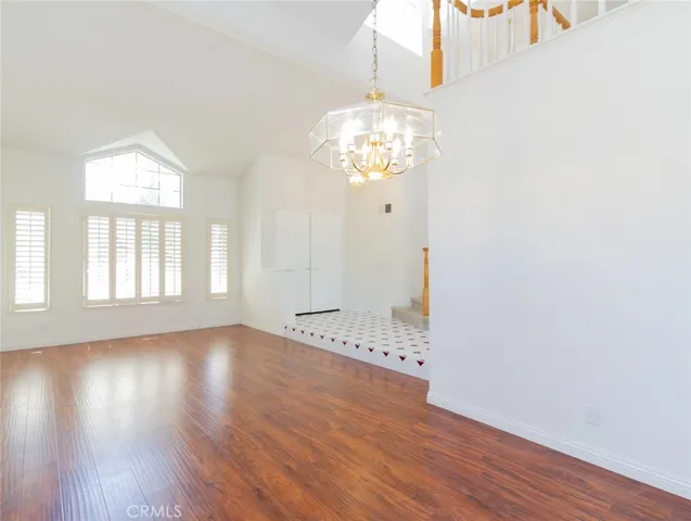 a kitchen with a sink and large window