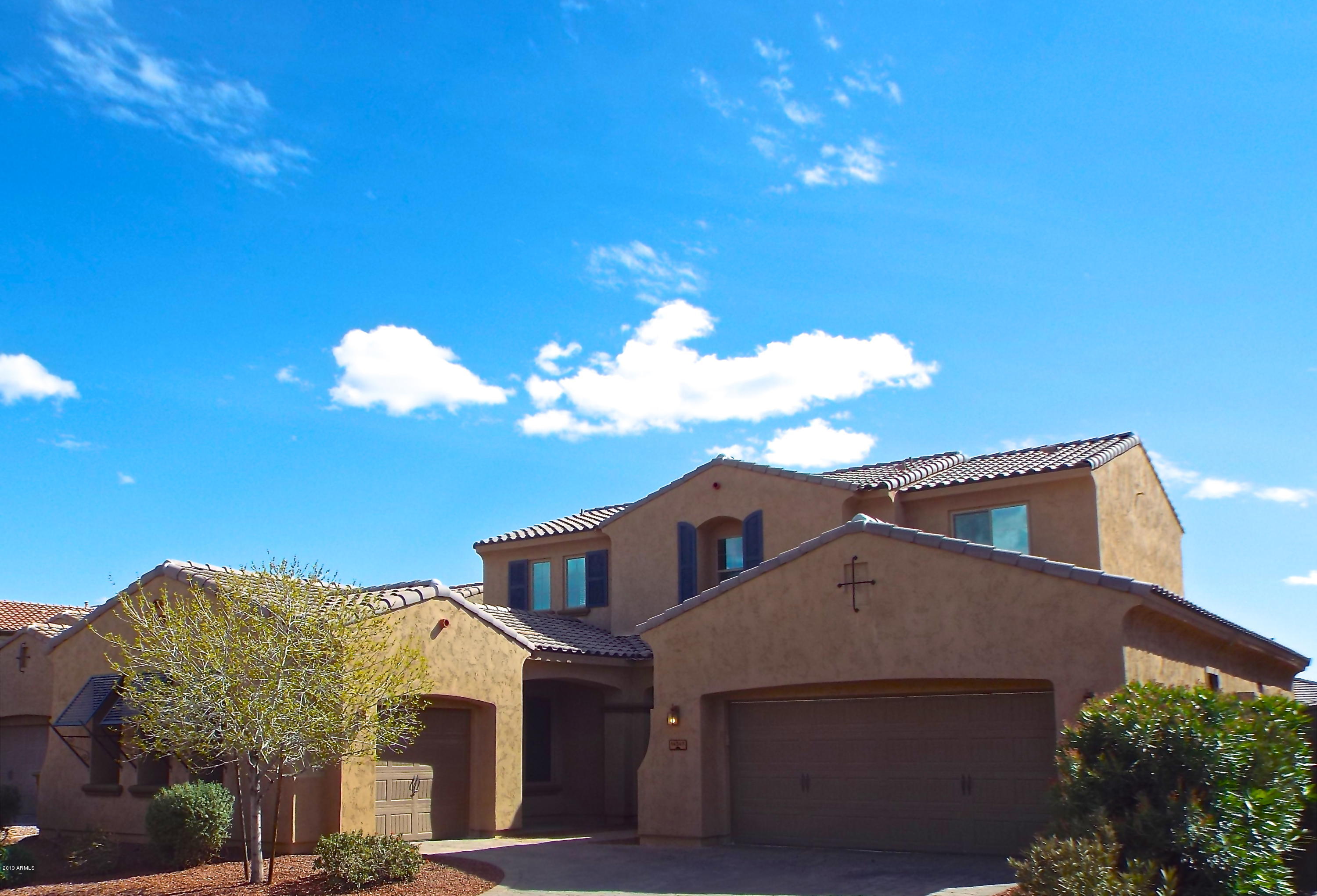 14347 West Coronado Road Goodyear, AZ 85395 - Photo 1 of 39 Beautifil Front in Dated Community