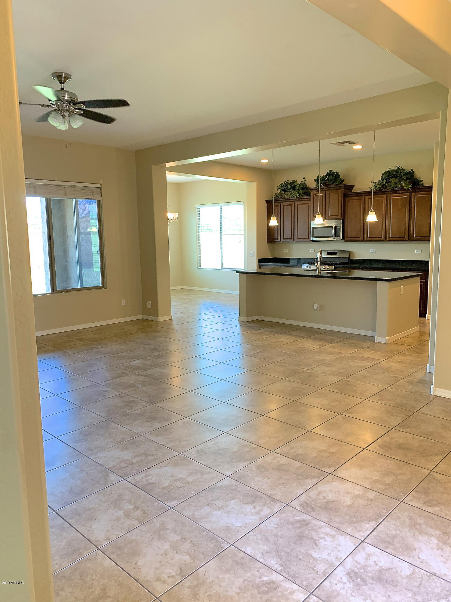 14347 West Coronado Road Goodyear, AZ 85395 - Photo 7 of 39 Huge Great Room Kitchen