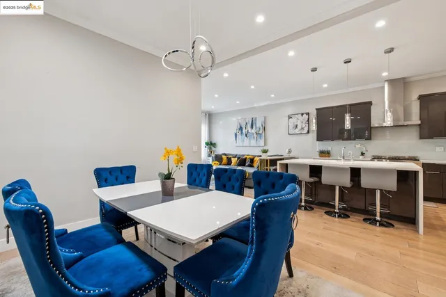 a spacious bedroom with a bed and couch