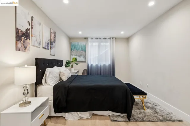 a kitchen with kitchen island a stove a table and chairs in it