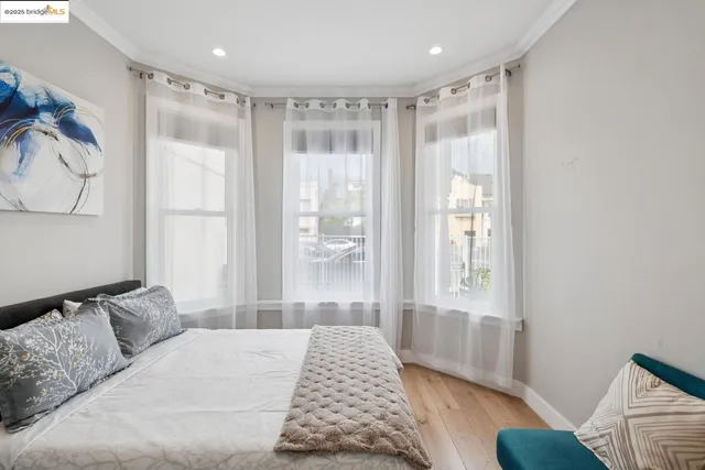 a large kitchen with stainless steel appliances kitchen island granite countertop a sink and cabinets
