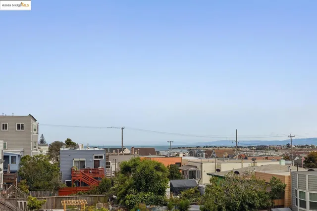 a bedroom with a bed and a chair