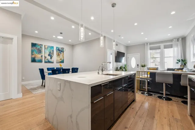 a bathroom with a sink a mirror and a shower