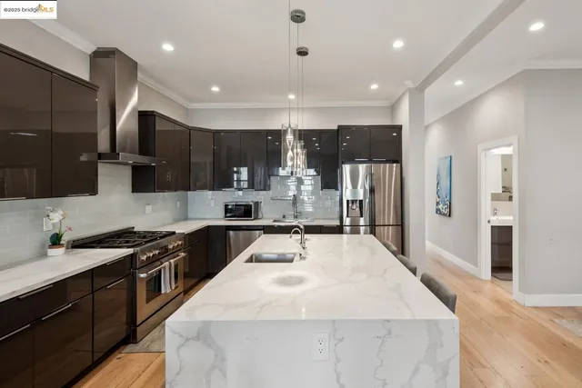 a bedroom with a large bed and a tv