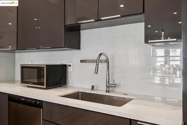 a bathroom with a shower a mirror and a shower