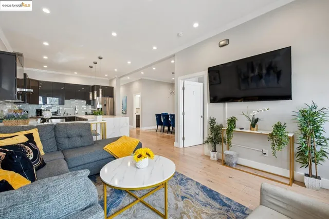 a view of livingroom with furniture and a rug