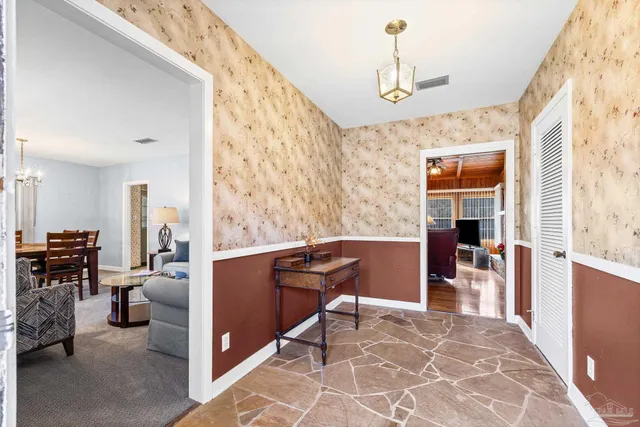 a living room with furniture and a couch