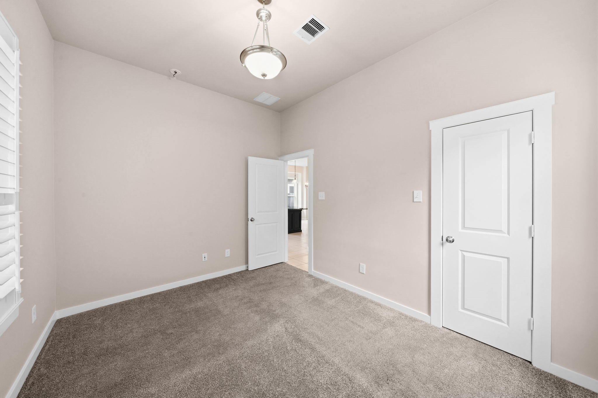 17019 Seminole Ridge Drive Cypress, TX 77433 - Photo 23 of 48 Opposite view of secondary bedroom off the kitchen area.