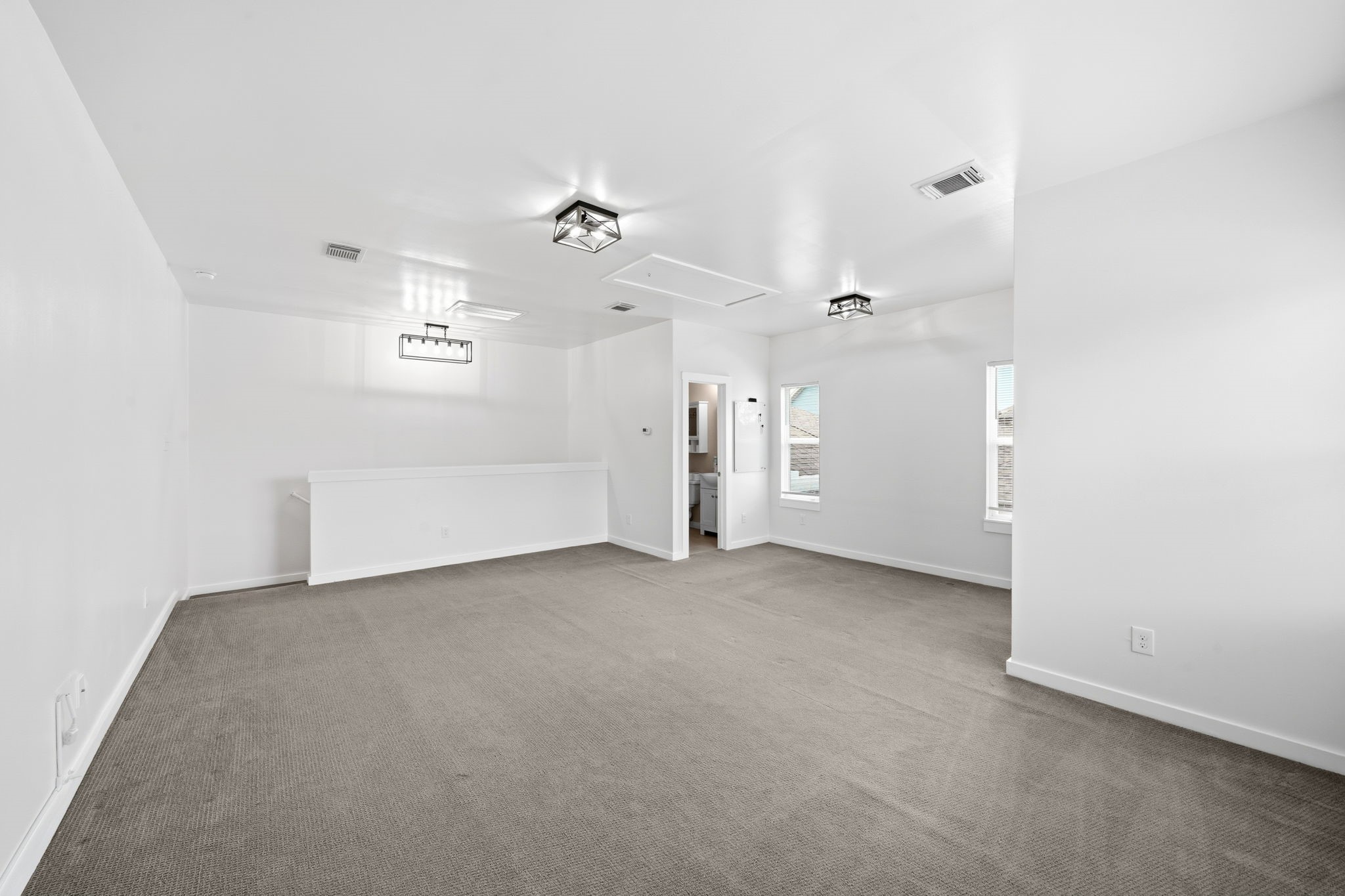 17019 Seminole Ridge Drive Cypress, TX 77433 - Photo 32 of 48 Generous layout with nearby bath access in this spacious bedroom or extra living space. It is in separate living quarters featuring plush carpet, modern lighting, and abundant natural light.