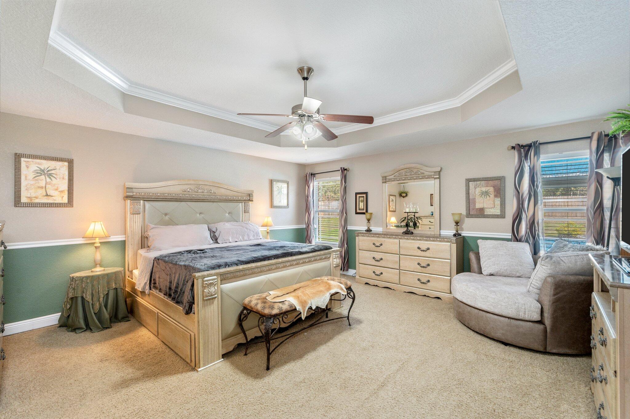 6262 Evan Circle Crestview, FL 32536 - Photo 24 of 45 a bedroom with a bed and ceiling fan