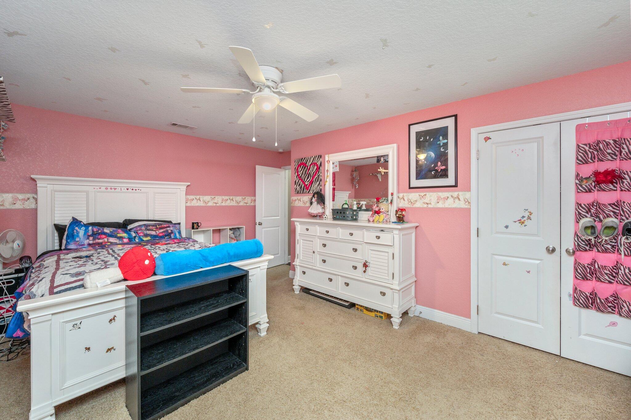 6262 Evan Circle Crestview, FL 32536 - Photo 34 of 45 a bedroom with furniture and a dresser