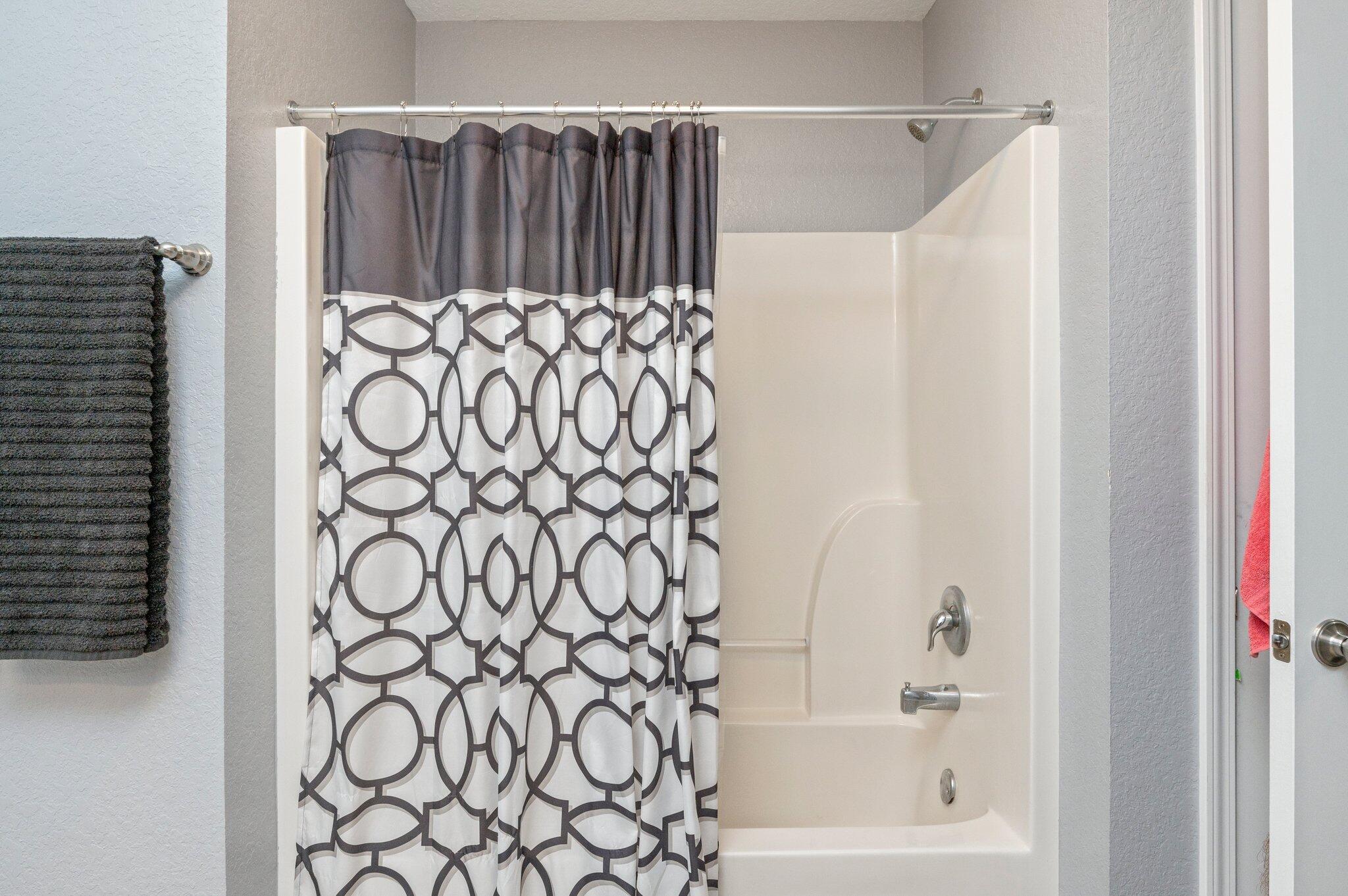 6262 Evan Circle Crestview, FL 32536 - Photo 36 of 45 a bathroom with a shower curtain and a shower curtain