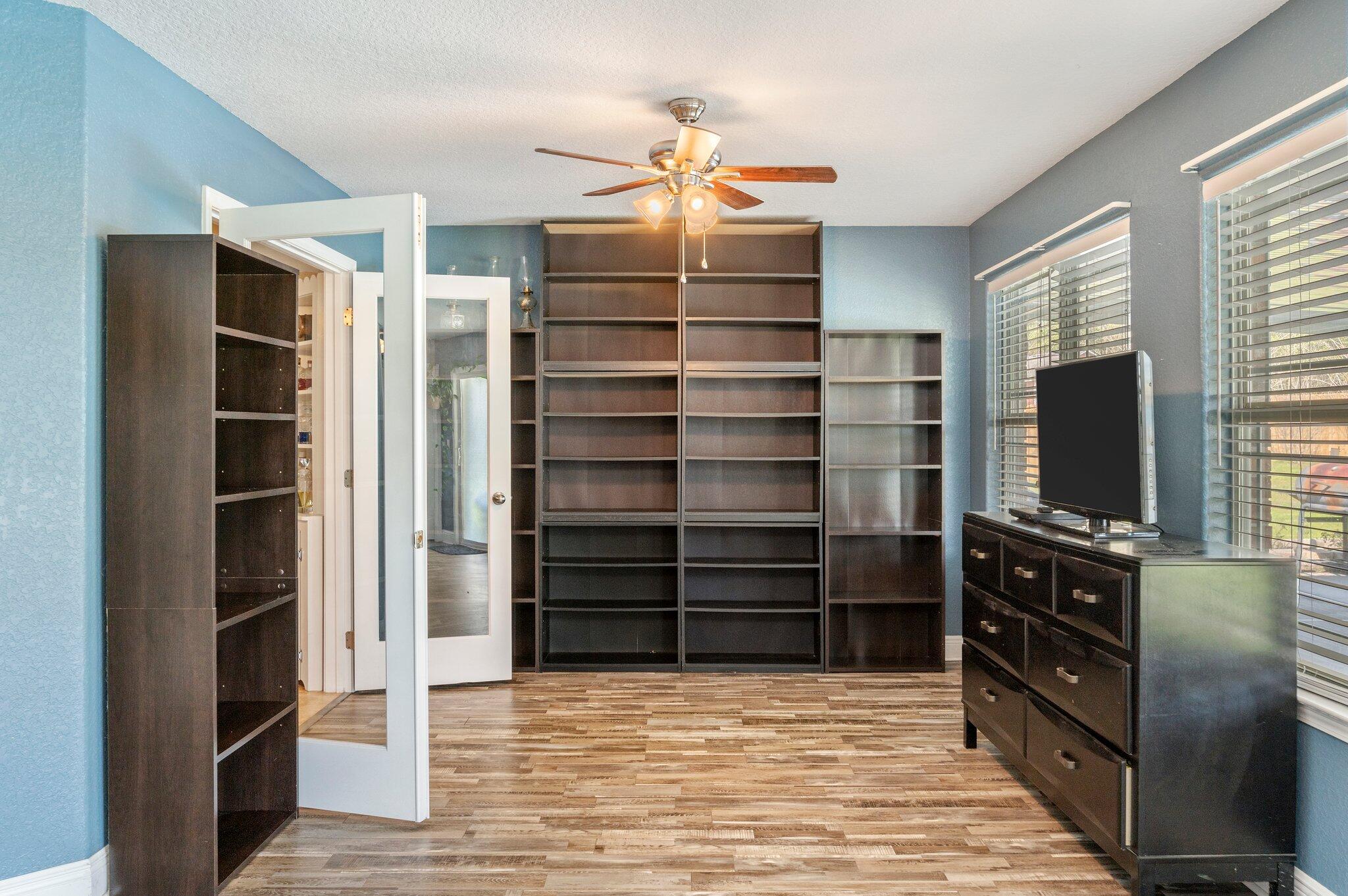 6262 Evan Circle Crestview, FL 32536 - Photo 38 of 45 a view of walk in closet with empty racks