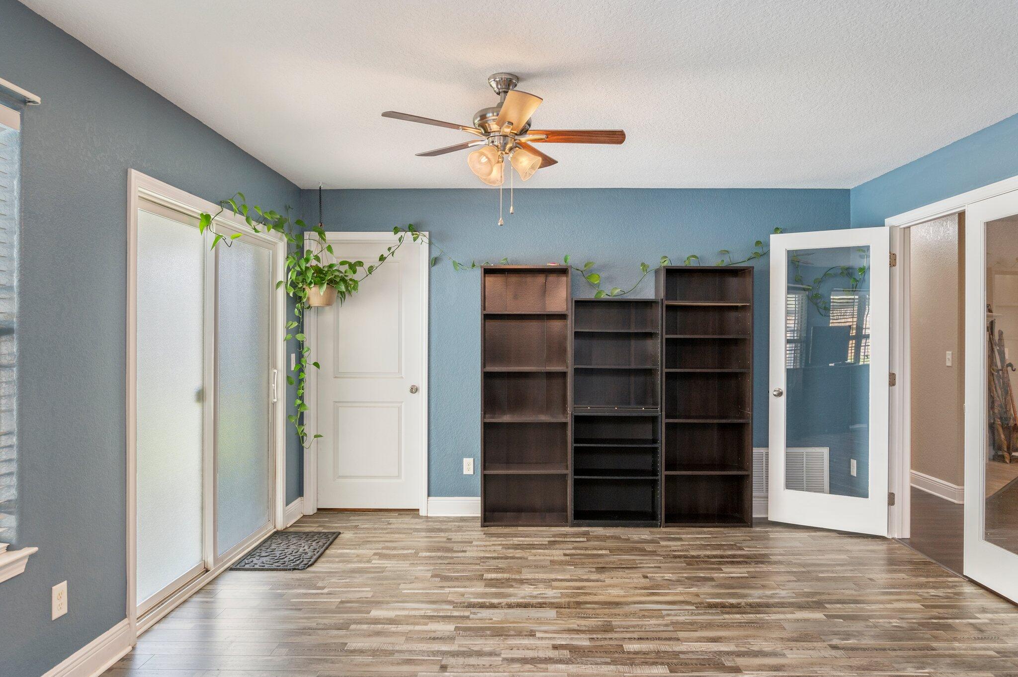6262 Evan Circle Crestview, FL 32536 - Photo 39 of 45 wooden floor in an empty room with a window