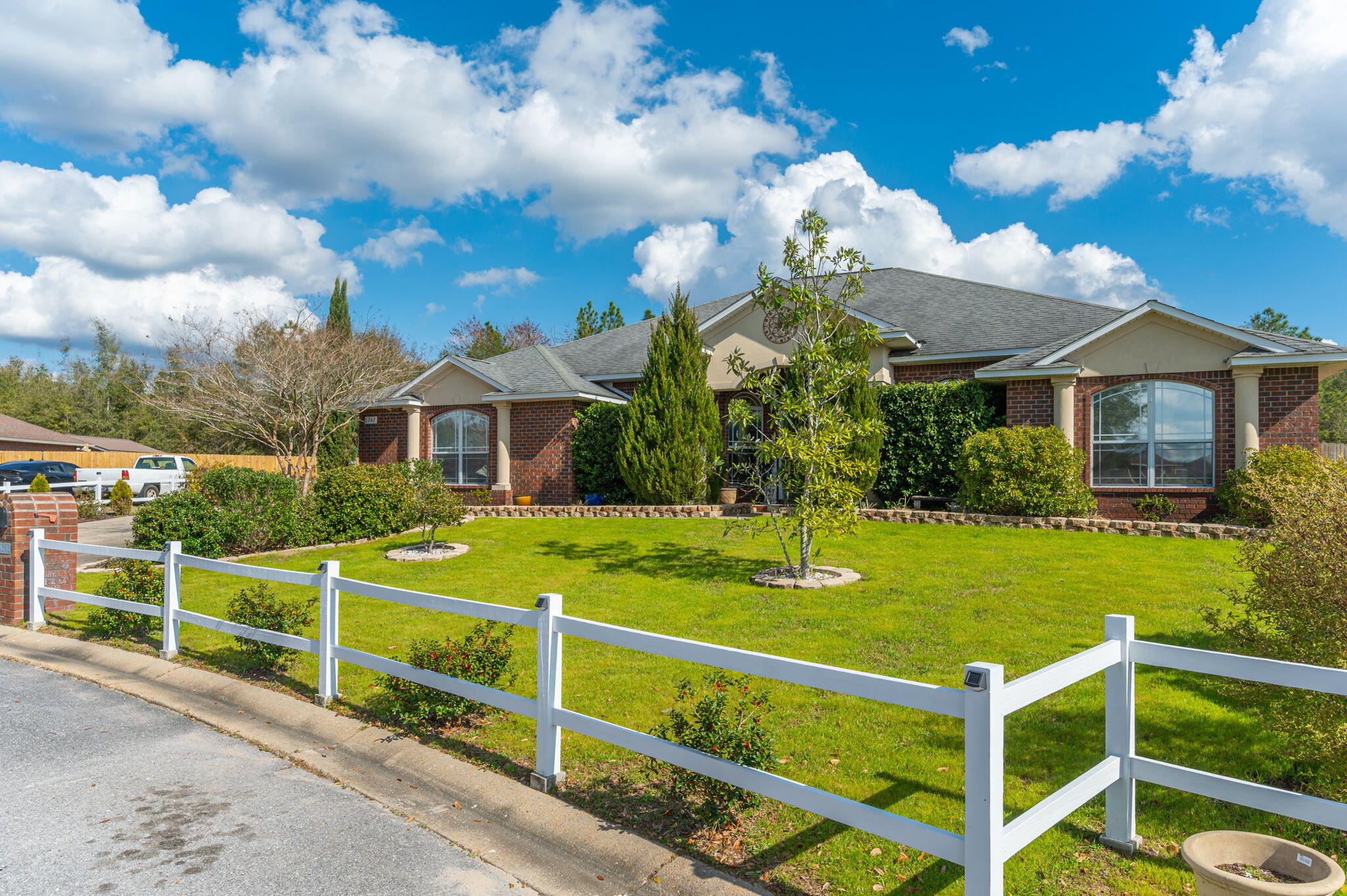 6262 Evan Circle Crestview, FL 32536 - Photo 5 of 45 a view of a house with backyard and porch