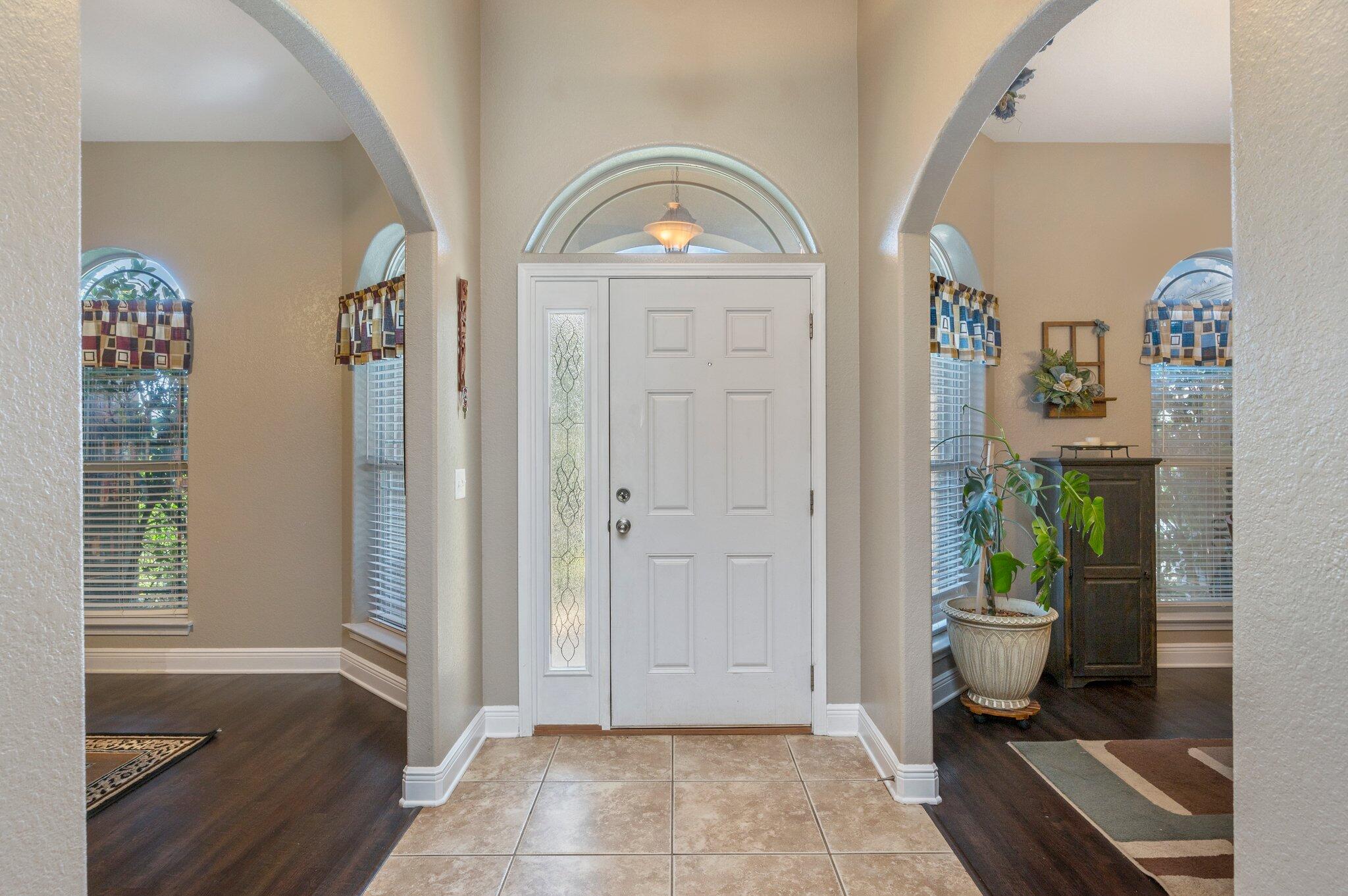 6262 Evan Circle Crestview, FL 32536 - Photo 7 of 45 a view of entryway with wooden floor