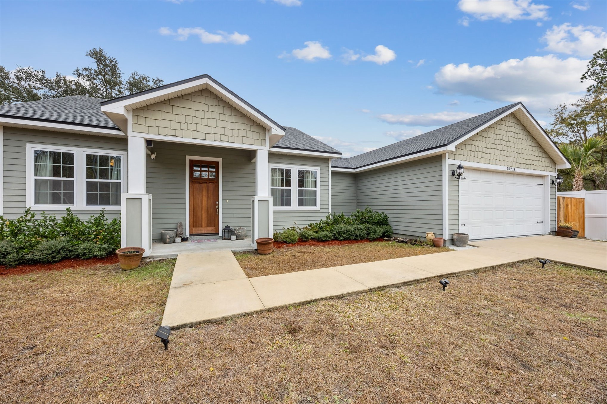 96718 Blackrock Road Yulee, FL 32097 - Photo 13 of 54 front view of house with a yard