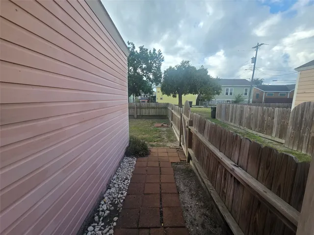 a view of a pathway with a balcony