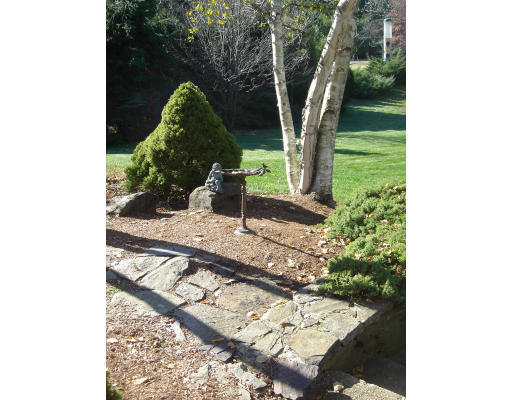 294 Brookfield Road Sturbridge, MA 01518 - Photo 6 of 28 a backyard of a house with seating space