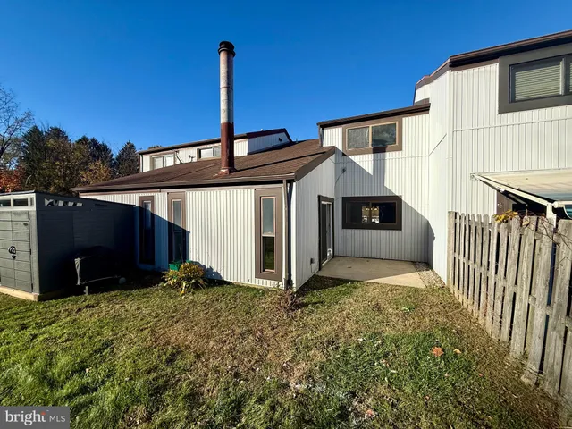 a front view of a house having yard