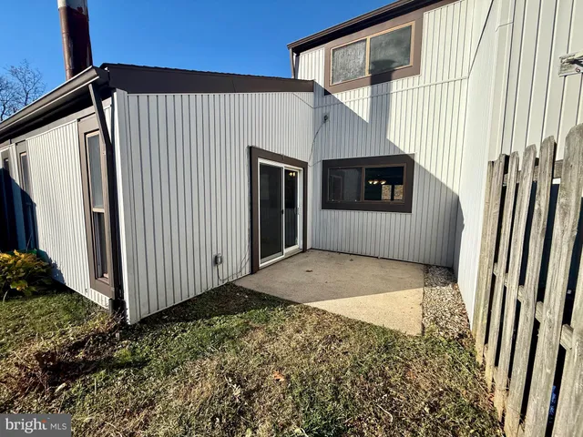 a house view with a backyard space