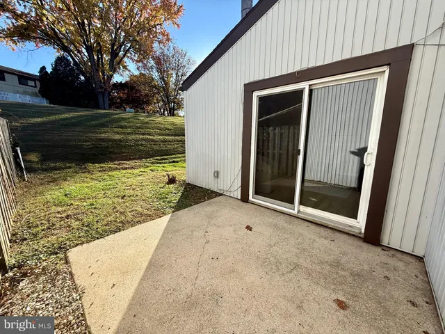 a view of backyard with green space