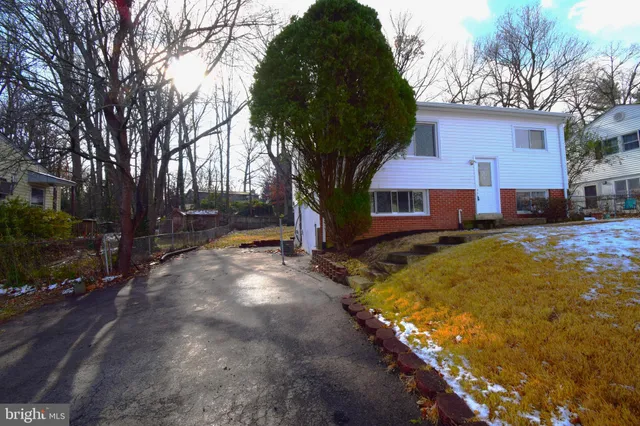 a view of swimming pool with outdoor seating