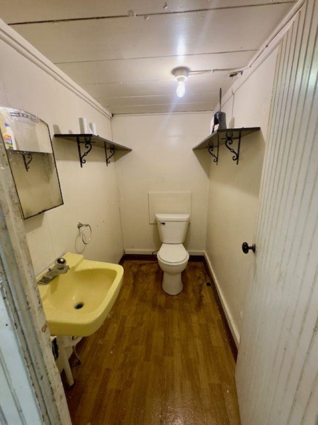 102 South Main Street Stockton, IL 61085 - Photo 6 of 6 a bathroom with a sink and mirror