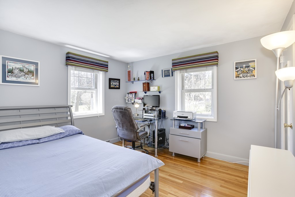 13 Cypress Road Natick, MA 01760 - Photo 6 of 24 a bedroom with a bed and a window