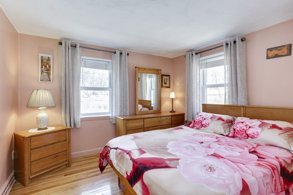13 Cypress Road Natick, MA 01760 - Photo 7 of 24 a bedroom with a bed and window