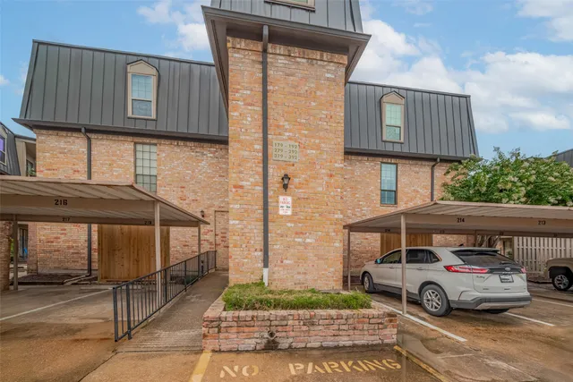 a car parked in front of a building