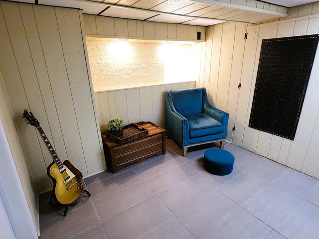 a living room with furniture and a window