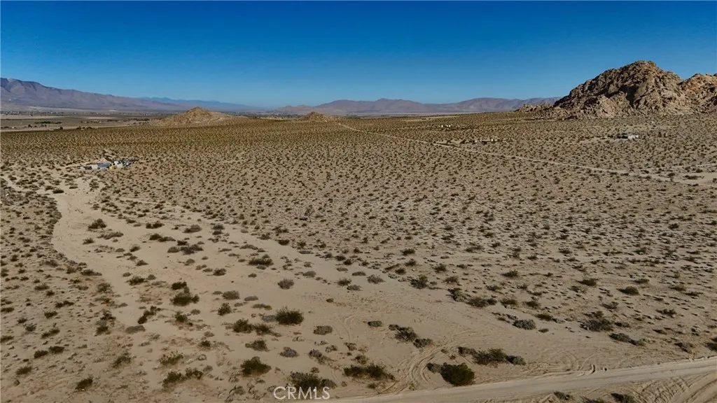 764 Rabbit Springs Lucerne Valley, CA 92356 - Photo 4 of 7 Red boundary lines on pictures are an estimate and for marketing purposes only. Buyer to verify all aspects of this property including, but not limited to utilities, assessments, boundaries, usage, access, and zoning to satisfy themselves.