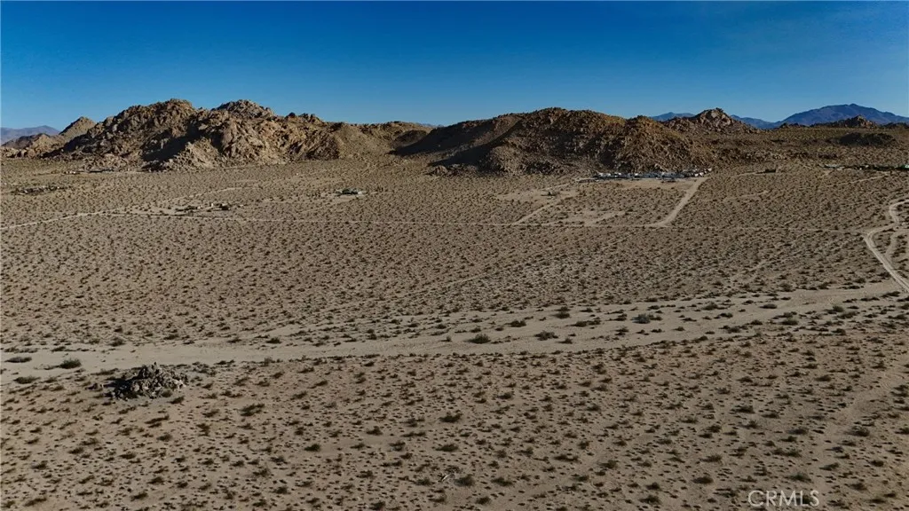 764 Rabbit Springs Lucerne Valley, CA 92356 - Photo 5 of 7 Red boundary lines on pictures are an estimate and for marketing purposes only. Buyer to verify all aspects of this property including, but not limited to utilities, assessments, boundaries, usage, access, and zoning to satisfy themselves.