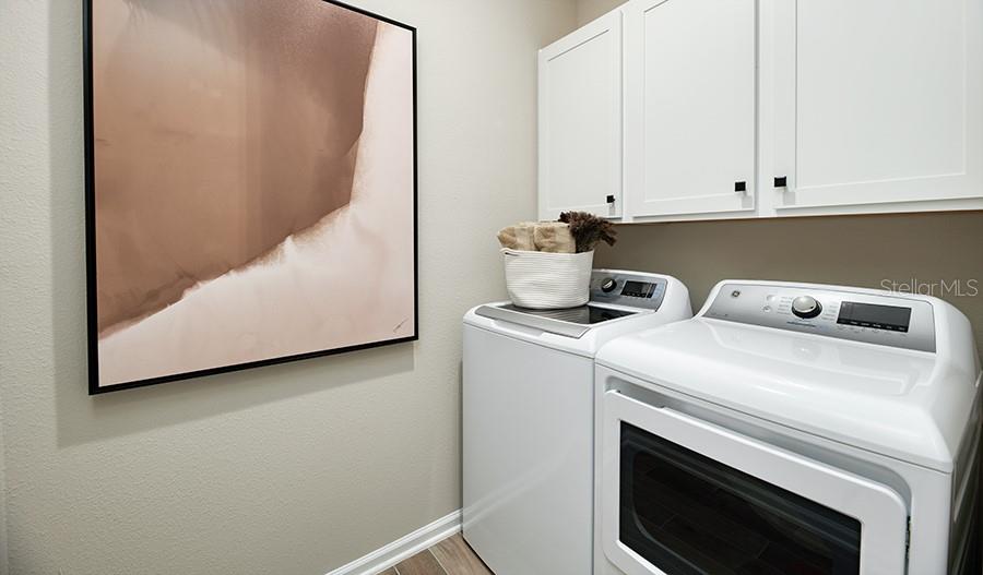 5129 Spring Maiden Circle Apollo Beach, FL 33572 - Photo 10 of 17 a utility room with dryer and washer