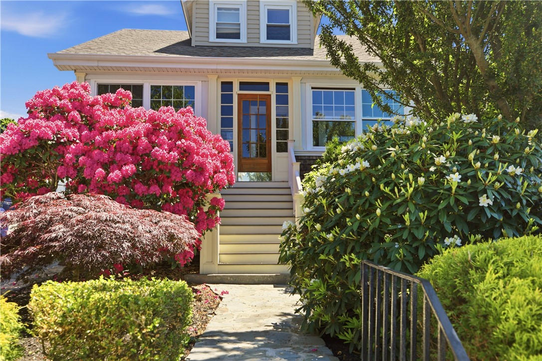 Landscaped with mature perennials, shrubs and landscaped stone walls
