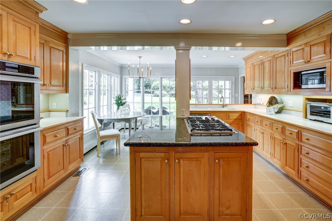 115 South Wilton Road Richmond, VA 23226 - Photo 12 of 33 a kitchen with stainless steel appliances granite countertop a stove a sink and a microwave