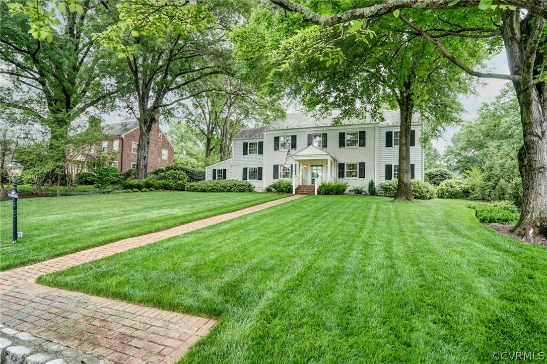 115 South Wilton Road Richmond, VA 23226 - Photo 2 of 33 a view of house with a big yard and large trees