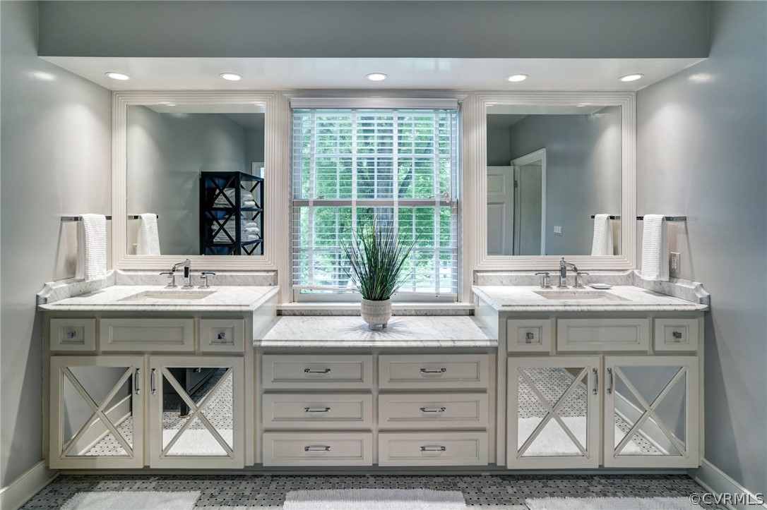115 South Wilton Road Richmond, VA 23226 - Photo 23 of 33 a bathroom with a granite countertop sink a mirror and a